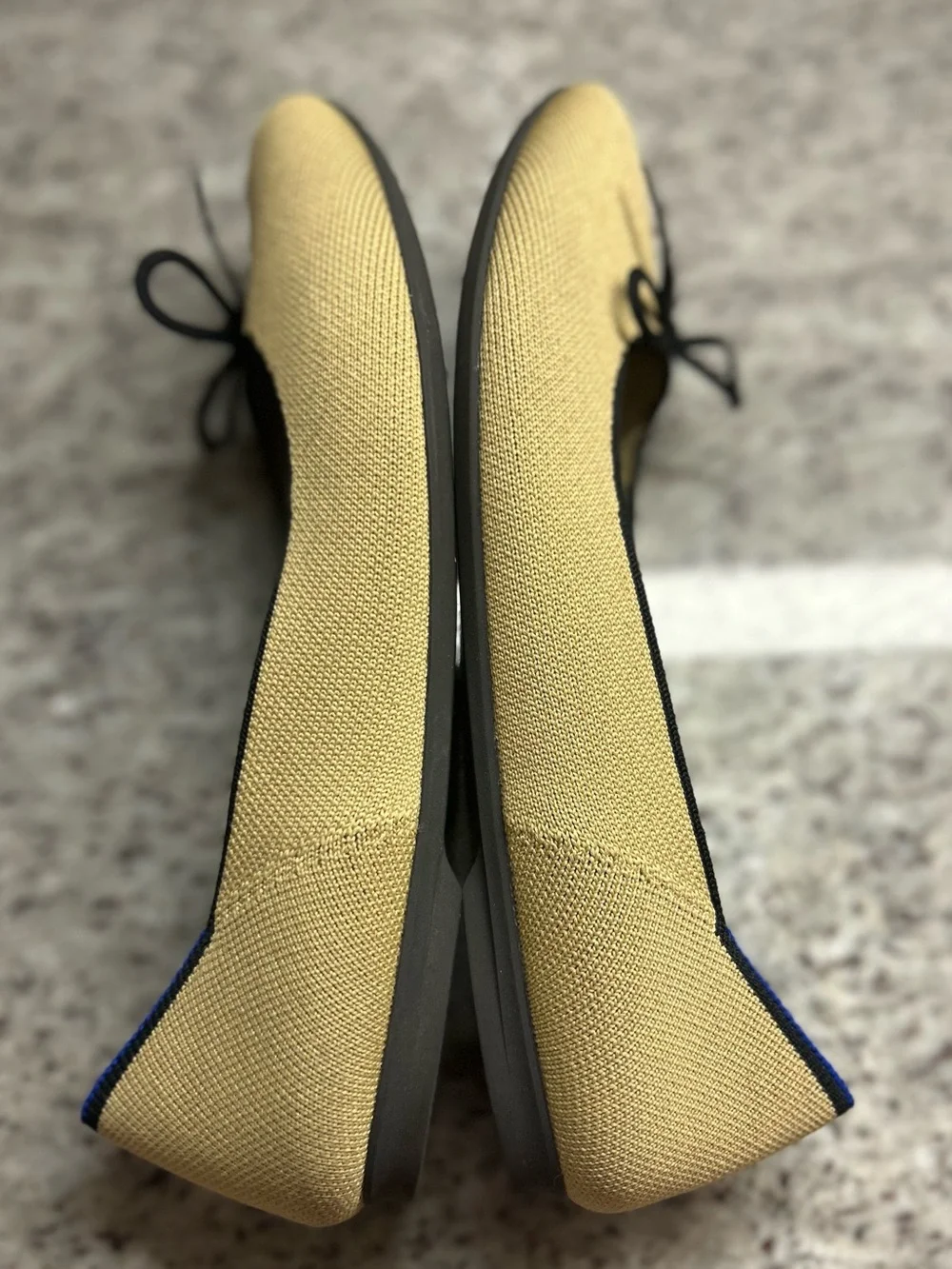 Rothy's Tan/cream Ballet Flats with Black Bow Trim and Blue Piping size 8